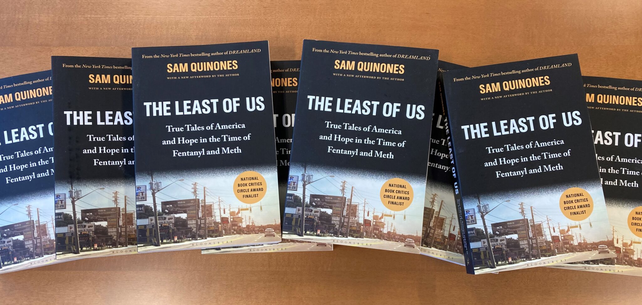 Multiple copies of The Least of Us by Sam Quinones
