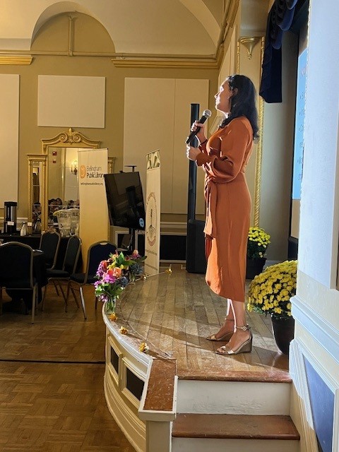 Monica Koller onstage at the Listen Deeply Community Voices Film Fest