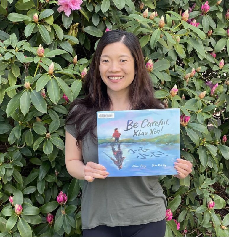 Librarian holding book