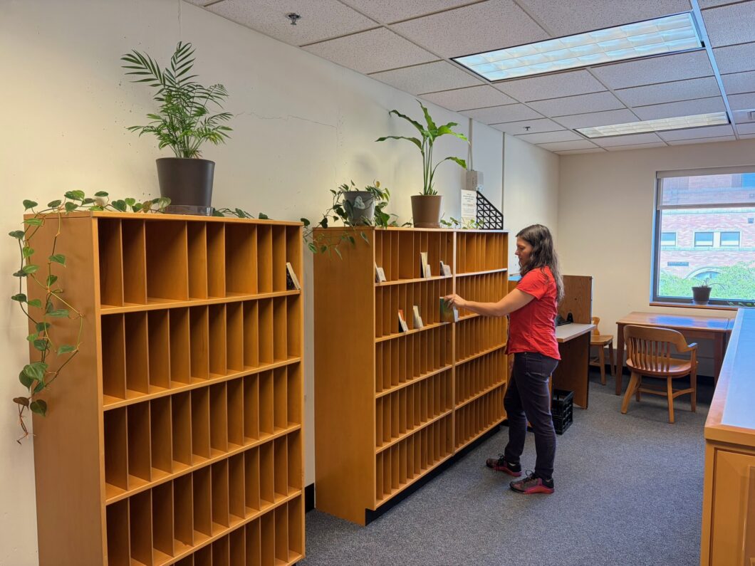 Person picking up Bellingham Public Library holds at WWU